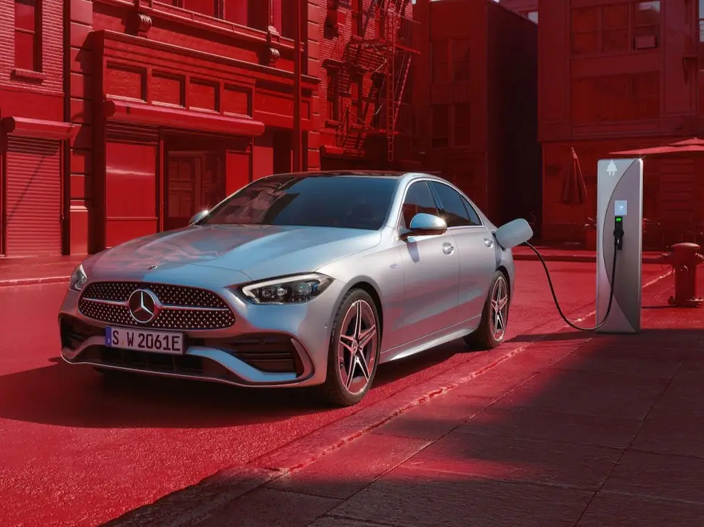 preowned-C-200-amg-line-Dynamic view of a Mercedes-Benz C-Class Saloon (driving shot) or standing at a charging station